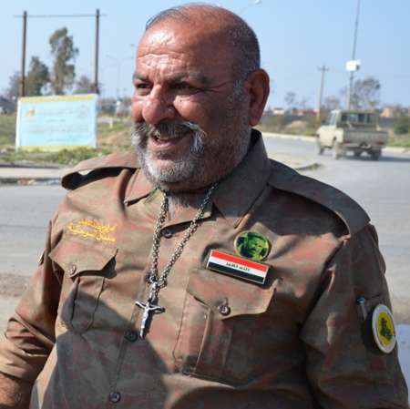 مسیحیان عراق زیر پرچم امام حسین (ع) با داعش می جنگند