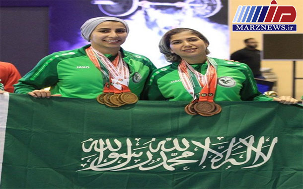 اولين حضور زنان عربستان دررقابت وزنه برداري +عكس