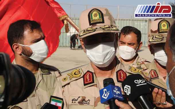 تبادل پرچم متبرک حرم امام رضا)ع( و حرم امام حسین)ع( در نقطه صفر مرزی مهران